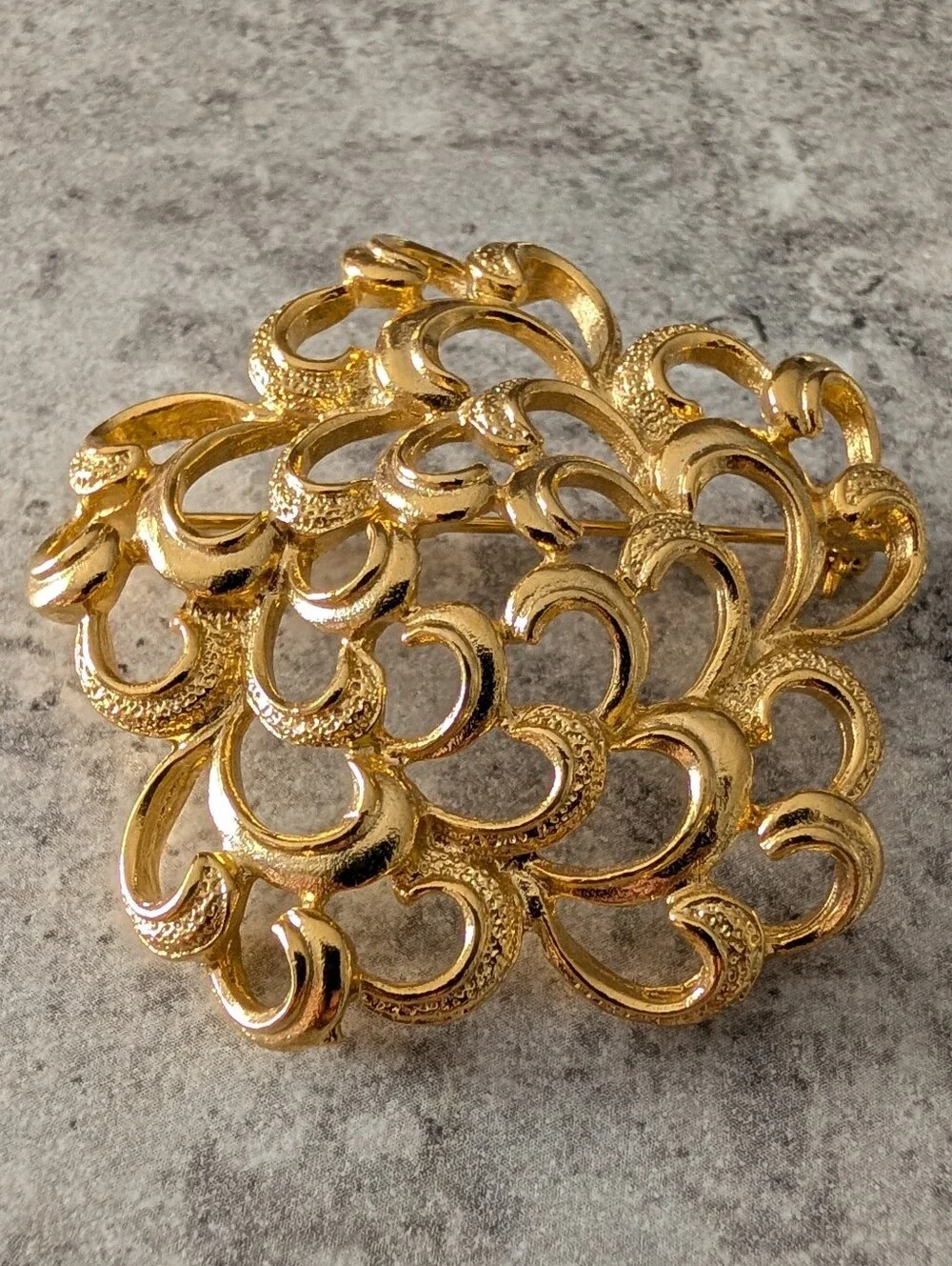 Gold Tone Textured Floral Openwork Or Scroll Design Brooch